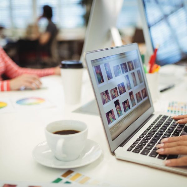 Graphic designers working at their desk in the office
